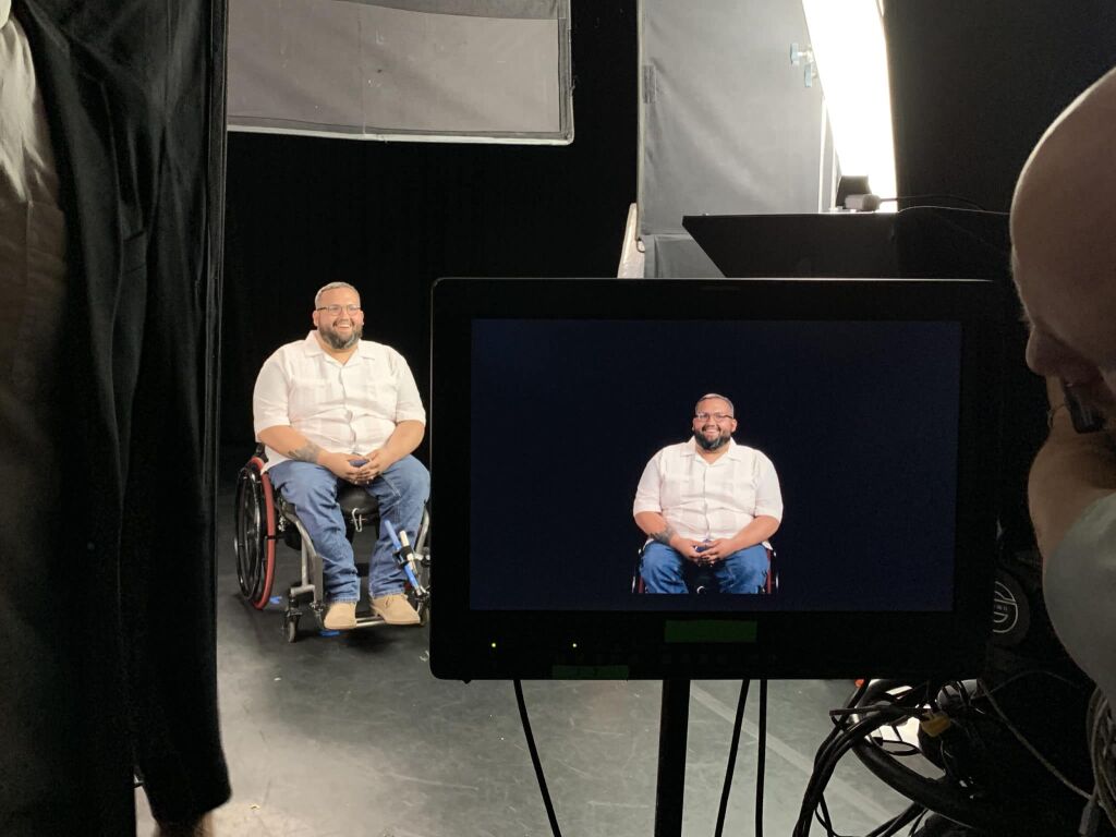 On set filming man in wheelchair for Words Matter gallery video