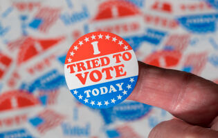 Red, white and blue sticker reading "I Tried To Vote Today."